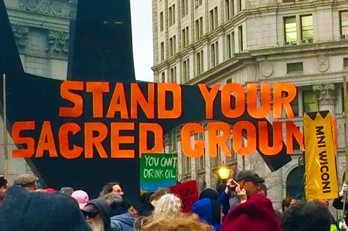 Standing Rocking protest. Stabd your sacred ground.
