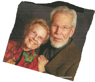 Picture of Barbara and John Wolf smiling.